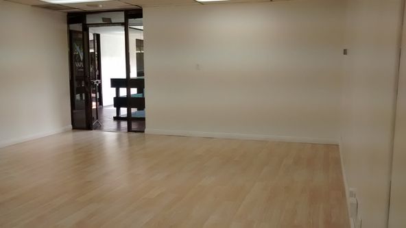 EXTRA LARGE OPEN ROOM, WOOD FLOORS. SEVERAL USES